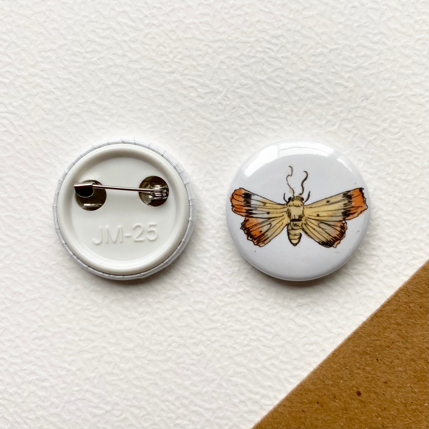 Yellow orange moth button