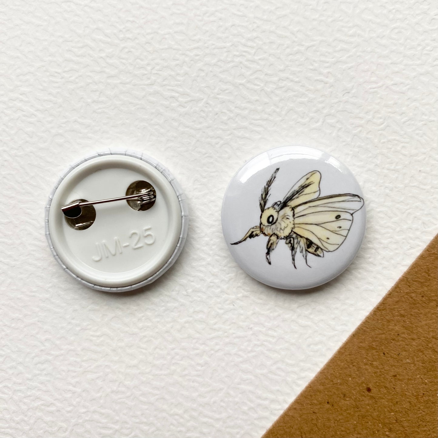 Silkmoth button