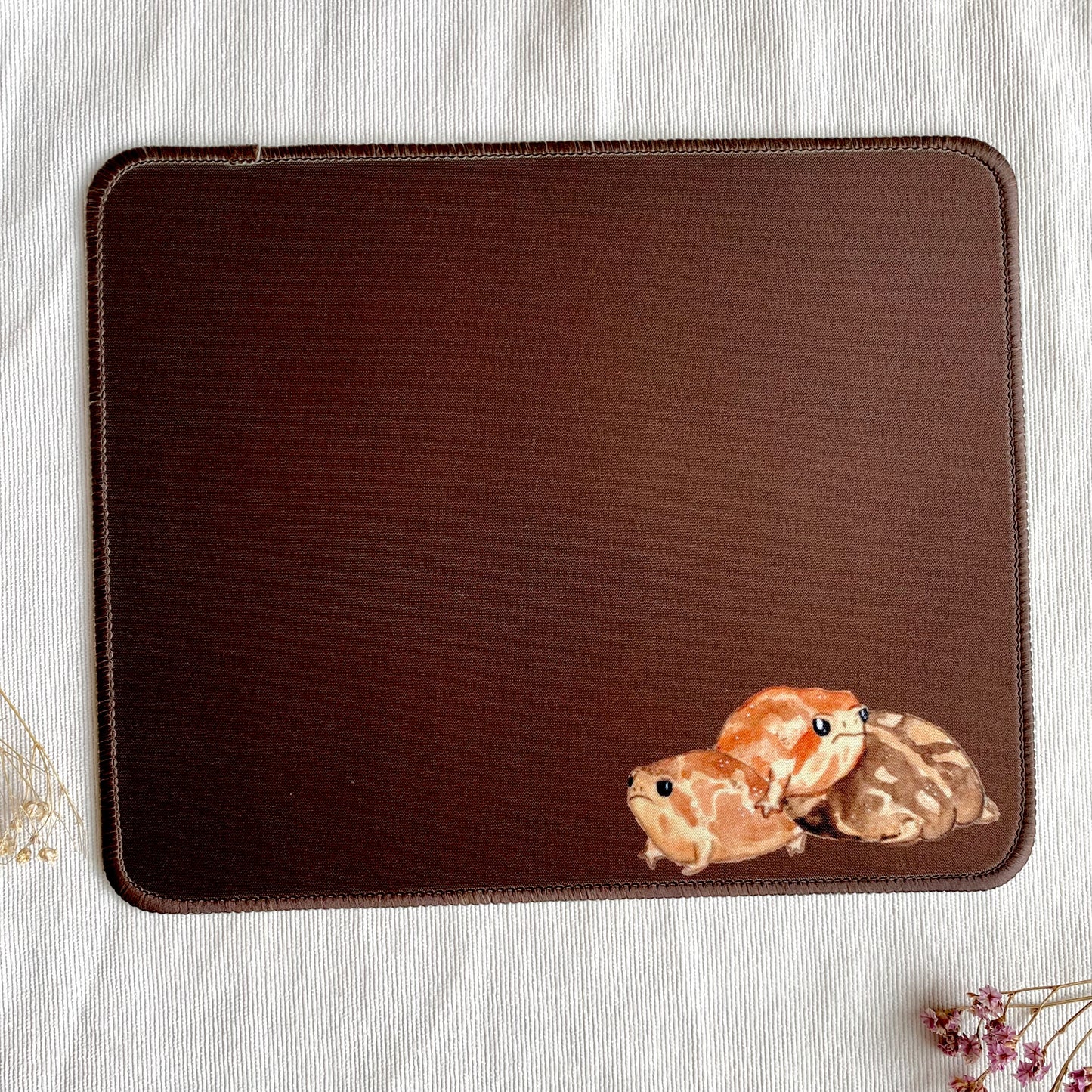 Brown frog mousepad