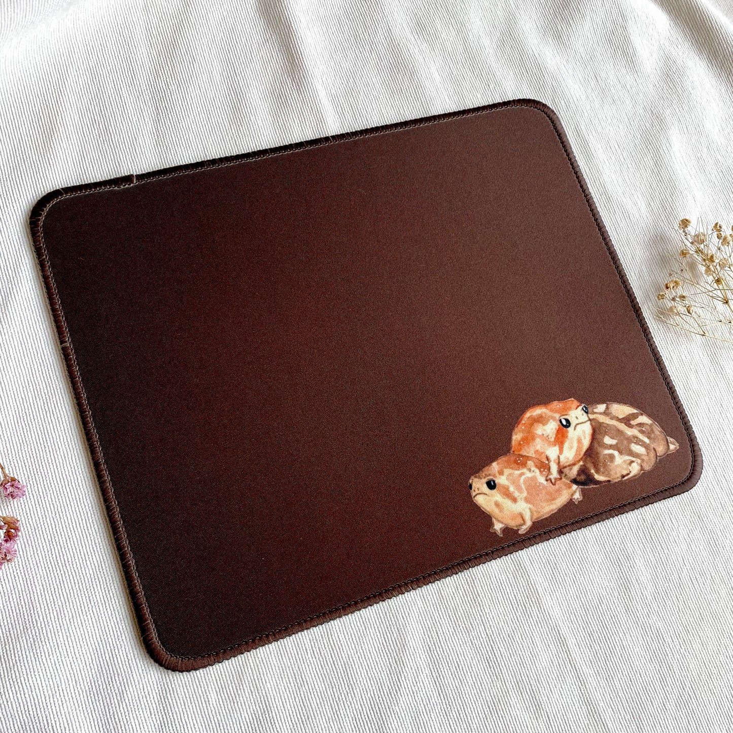 Brown frog mousepad